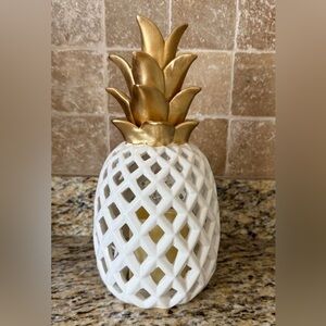 Pineapple candle holder.